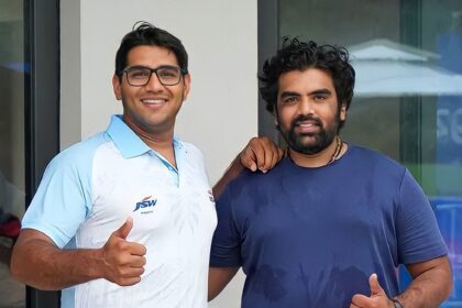 Hangzhou: Indian shooters Kynan Darius Chenai and Prithviraj Tondaiman pose for a photo after the Trap-75 Team Men (Phase 1) event at the 19th Asian Games,