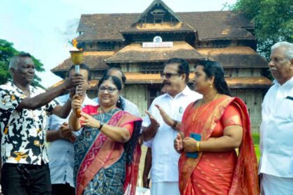 Minister Dr. Dr. R. Bindu handed over The torch to I.M. Vijayan former Indian football captain