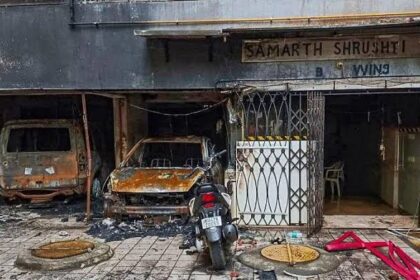 Charred vehicles after a fire broke out in a multi-storey residential building in Goregaon area Mumbai